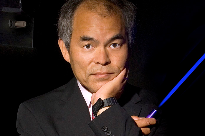 Shuji Nakamura holding a blue LED